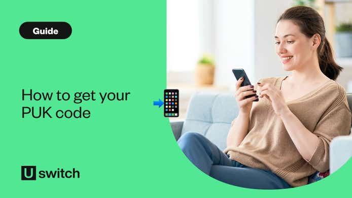woman using mobile phone sat on her sofa